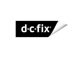 Ein schwarzer rechteckiger Aufkleber mit einer eingerollten Ecke, der den Text d-c-fix® in fetten weißen Buchstaben auf einem schlichten hellen Hintergrund zeigt.