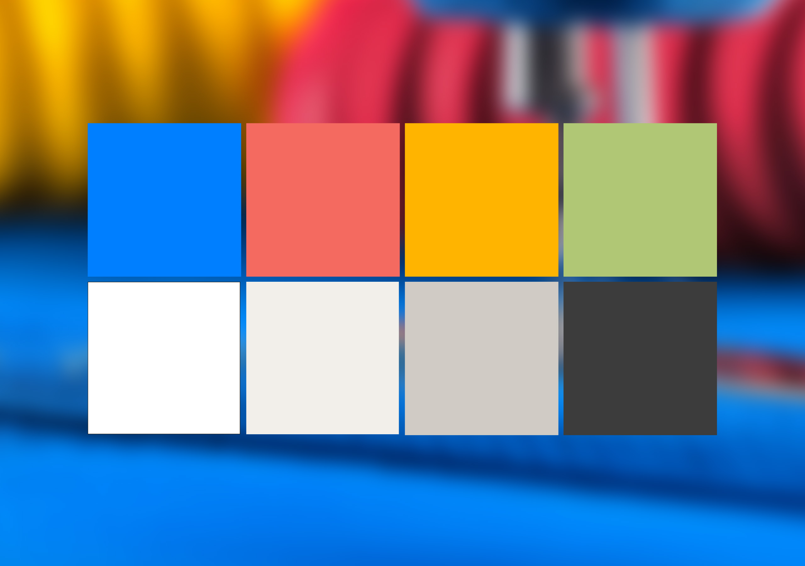 Acht Farbmuster sind in zwei Reihen zu je vier angeordnet. Obere Reihe: Blau, Korallenrot, Gelb, Hellgrün. Untere Reihe: Weiß, Cremeweiß, Hellgrau, Dunkelgrau. Der Hintergrund ist mit Blau-, Gelb- und Rottönen verwischt.